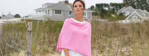 Caroline Grace by Alashan Cashmere, a brand known for its colorful cotton cashmere dress toppers and accessories. The signature Trade Wind Cotton Cashmere Poncho Dress Topper comes in over 50 colors.