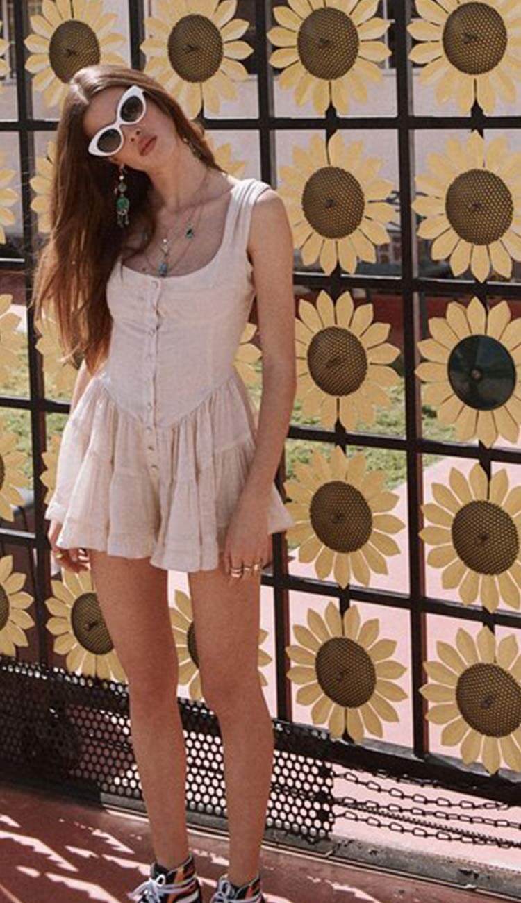 woman wearing a short dress and Vanessa Mooney Jewelry