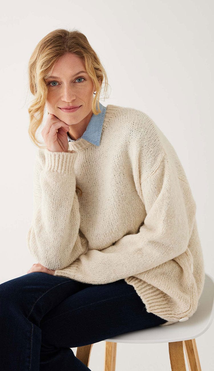 Bari Sweater in Buttercream - a beautiful one-size sweater front view by MerSea at Paula & Chlo