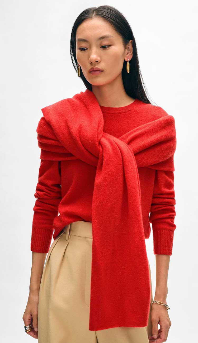 White + Warren cashmere travel wrap in Carmine Red, a lightweight rectangular 100% cashmere wrap styled as a scarf.