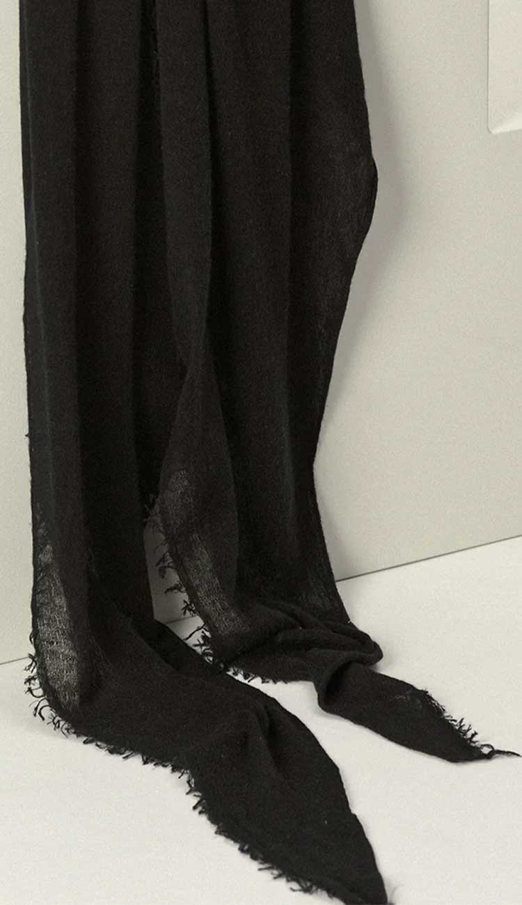 BLACK SCARF ON A LIGHT GREY BACKGROUND