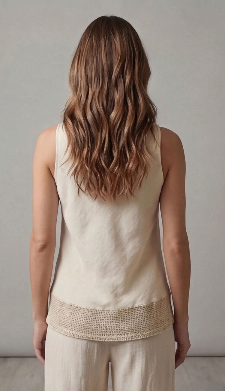 Woman wearing the milio milano butter sleeveless top back view