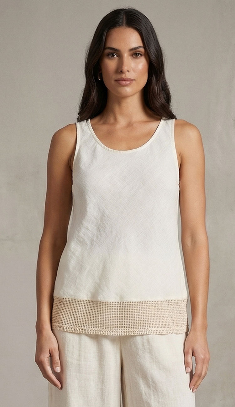 Woman wearing the milio milano butter sleeveless top matching pants against a neutral background