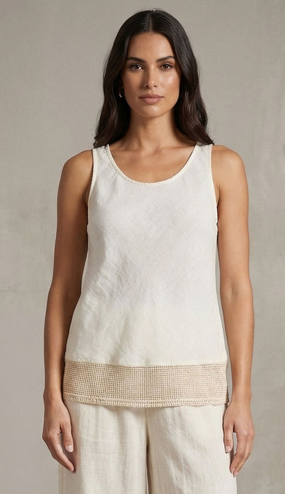 Woman wearing the milio milano butter sleeveless top matching pants against a neutral background