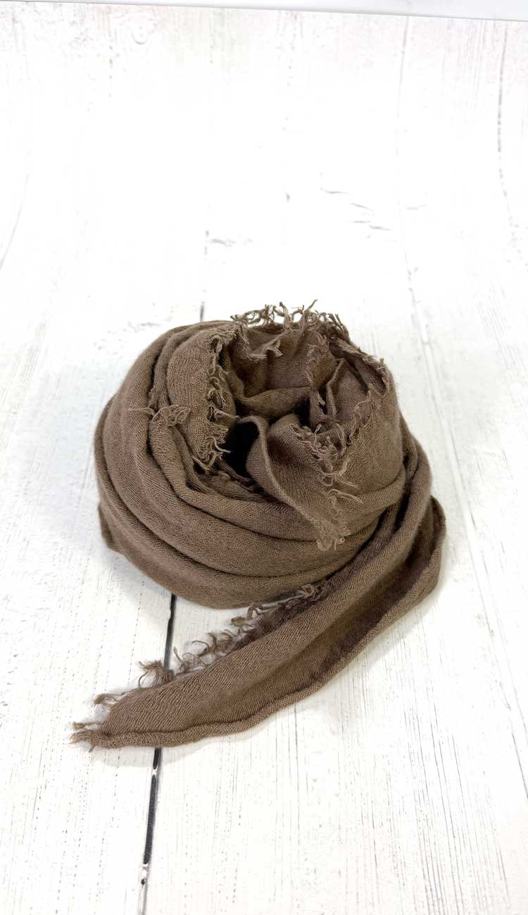 light brown scarf on a white background