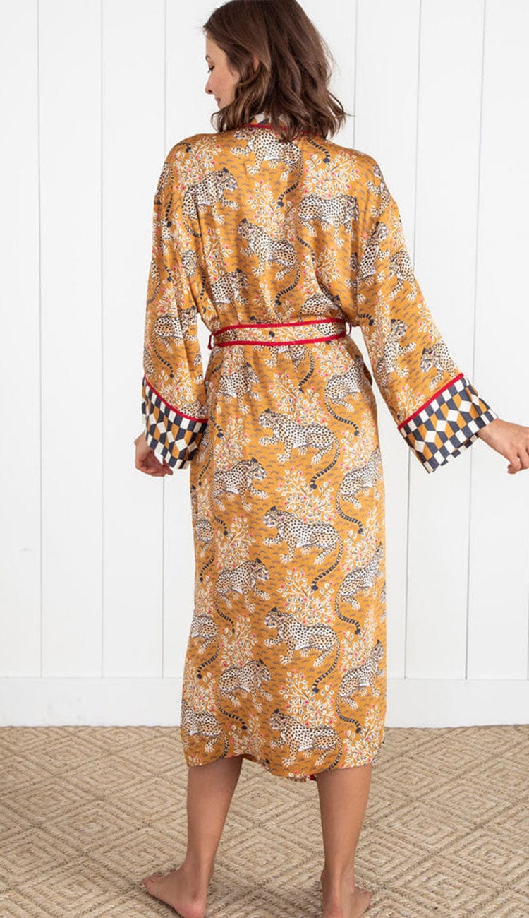 Back view of a Woman wearing a Printfresh lightweight viscose robe in a tobacco leopard print, shown on a light background.