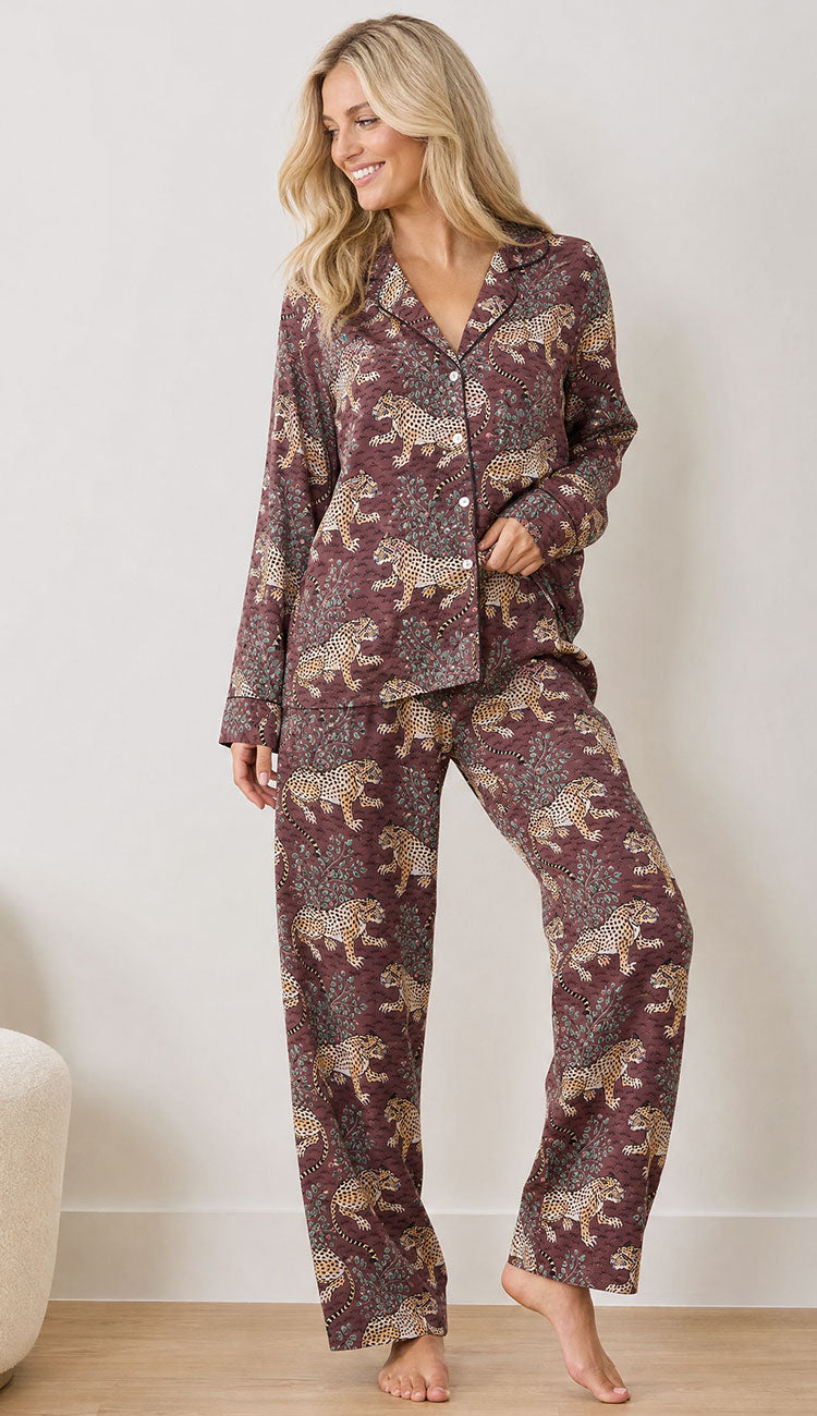 Printfresh Bagheera Organic Cotton Pajamas  - leopard print in raisin brown on a model on a white background