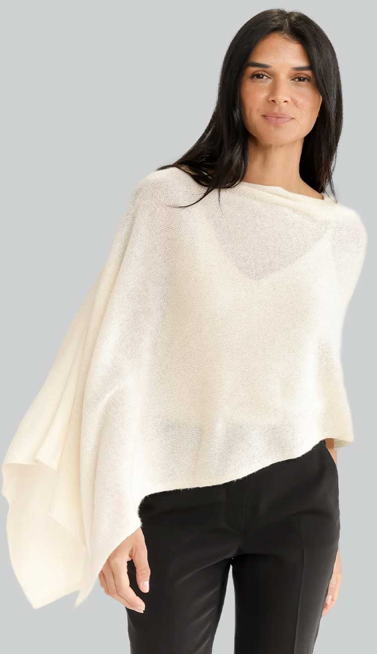 Alashan cashmere topper poncho in snow lightweight one-size wrap with draped silhouette.