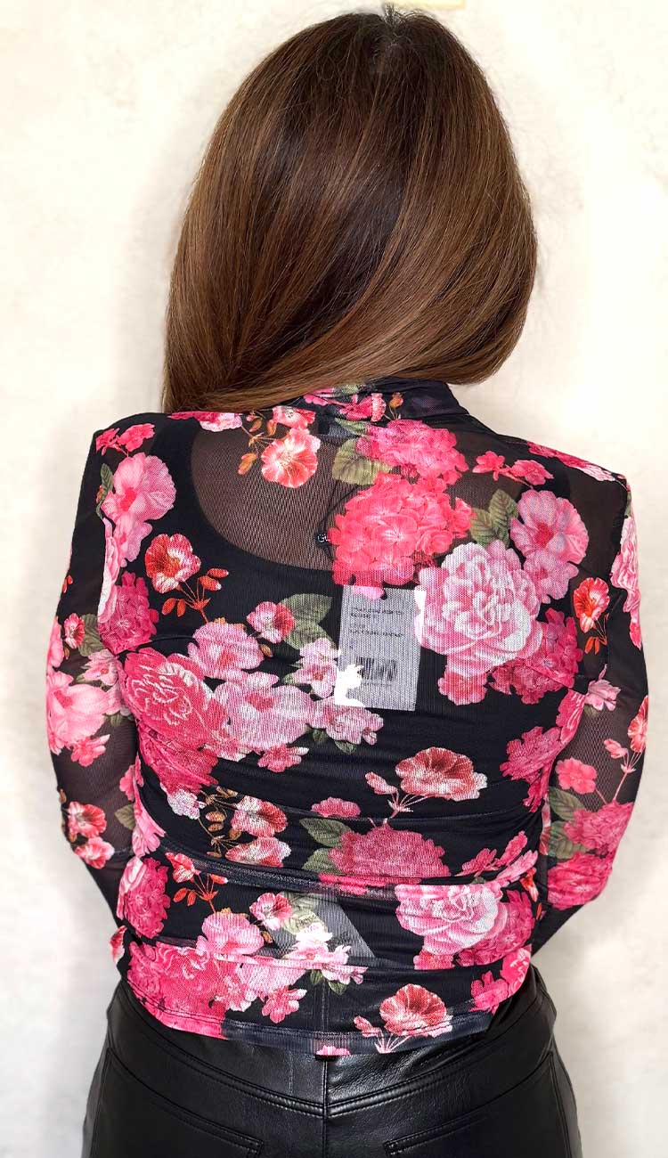 tyla floral mesh top with floral print on black back view with black leather pants