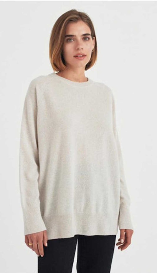 white and warren boyfriend sweater on model in parchment heather cashmere on a white background