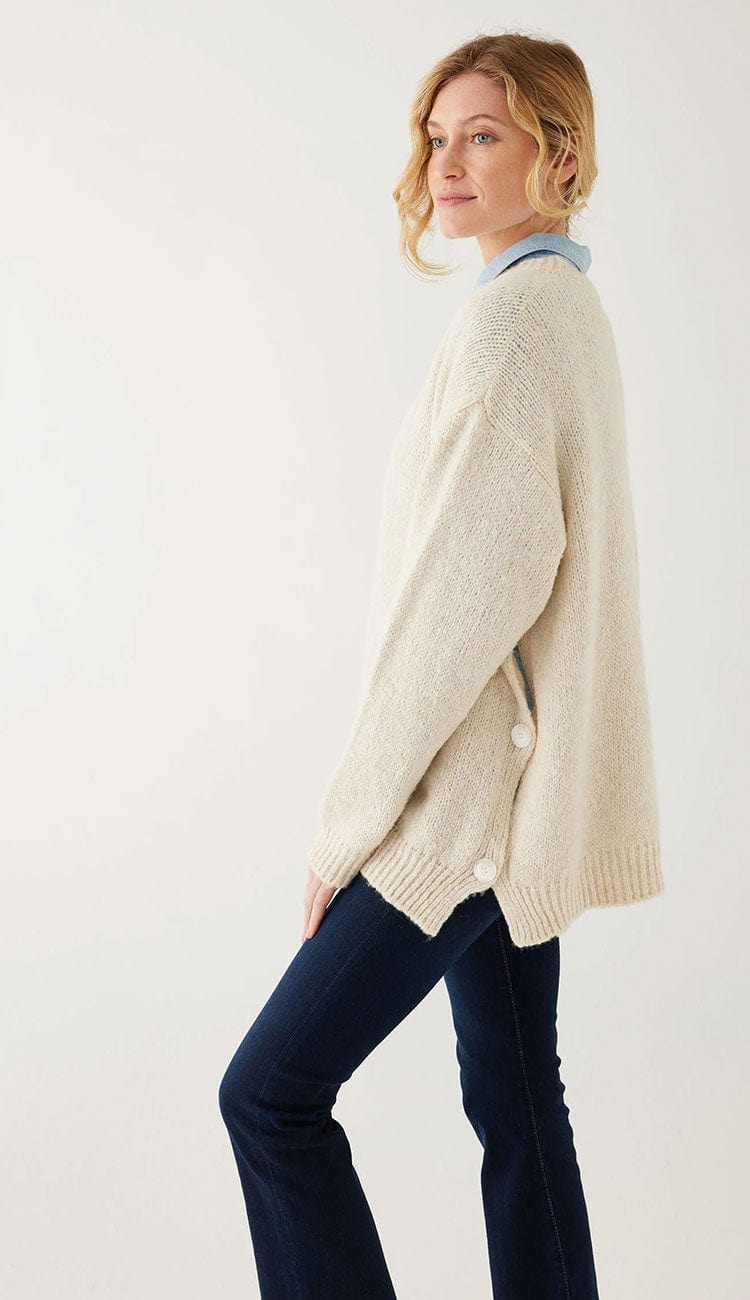 Bari Sweater in Buttercream - a beautiful one-size sweater side view by MerSea at Paula & Chlo