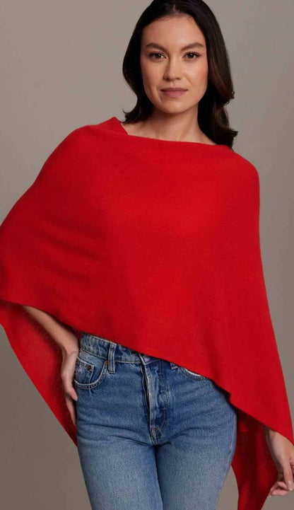 Alashan cashmere dress topper poncho in bombshell lightweight one-size wrap with draped silhouette.
