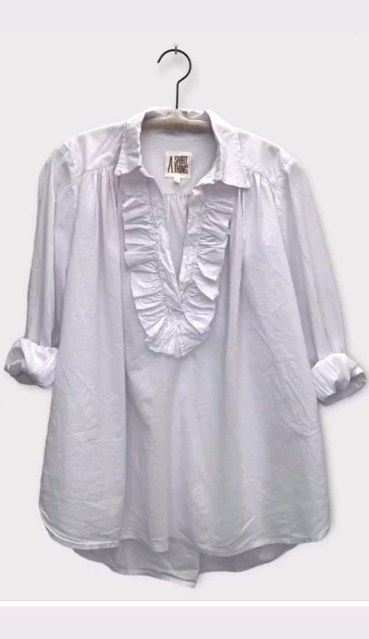 Celine Cabo shirt by A Shirt Thing at Paula and Chlo. Shown on hanger with rolled sleeves.