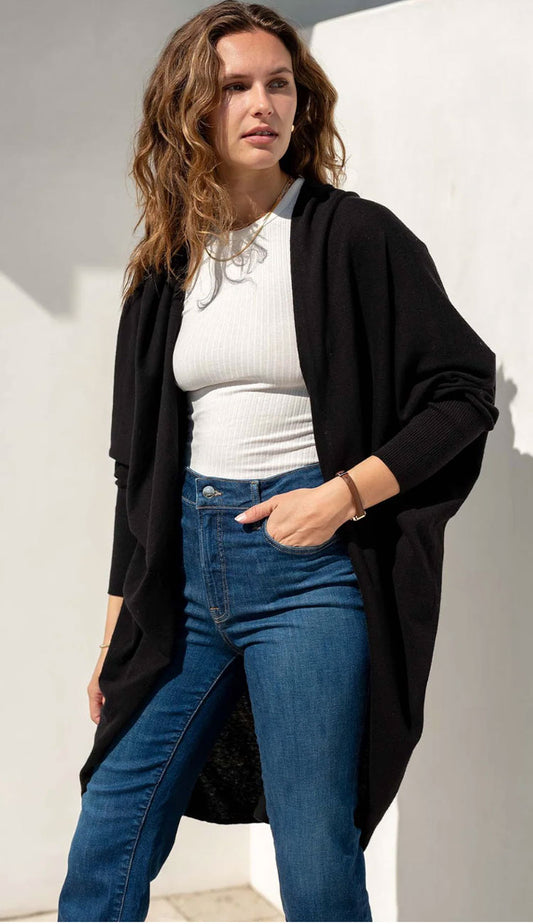Chelsea Kimono in black on a model wearing jeans and a white tee 