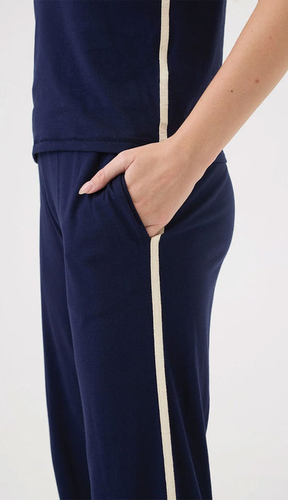 Everyday pant and San Tropez top by goldie in navy with a cream stripe on each side of the top and bottom
