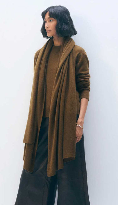 White + Warren cashmere travel wrap in Golden Brown, a lightweight rectangular 100% cashmere wrap styled as a scarf.