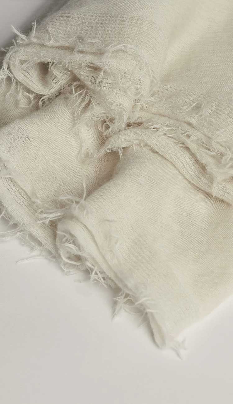 grisal milk colored scarf on a white background