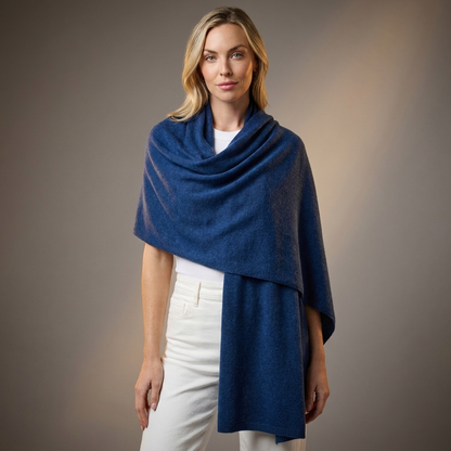 woman wearing a denim blue breezy travel wrap
