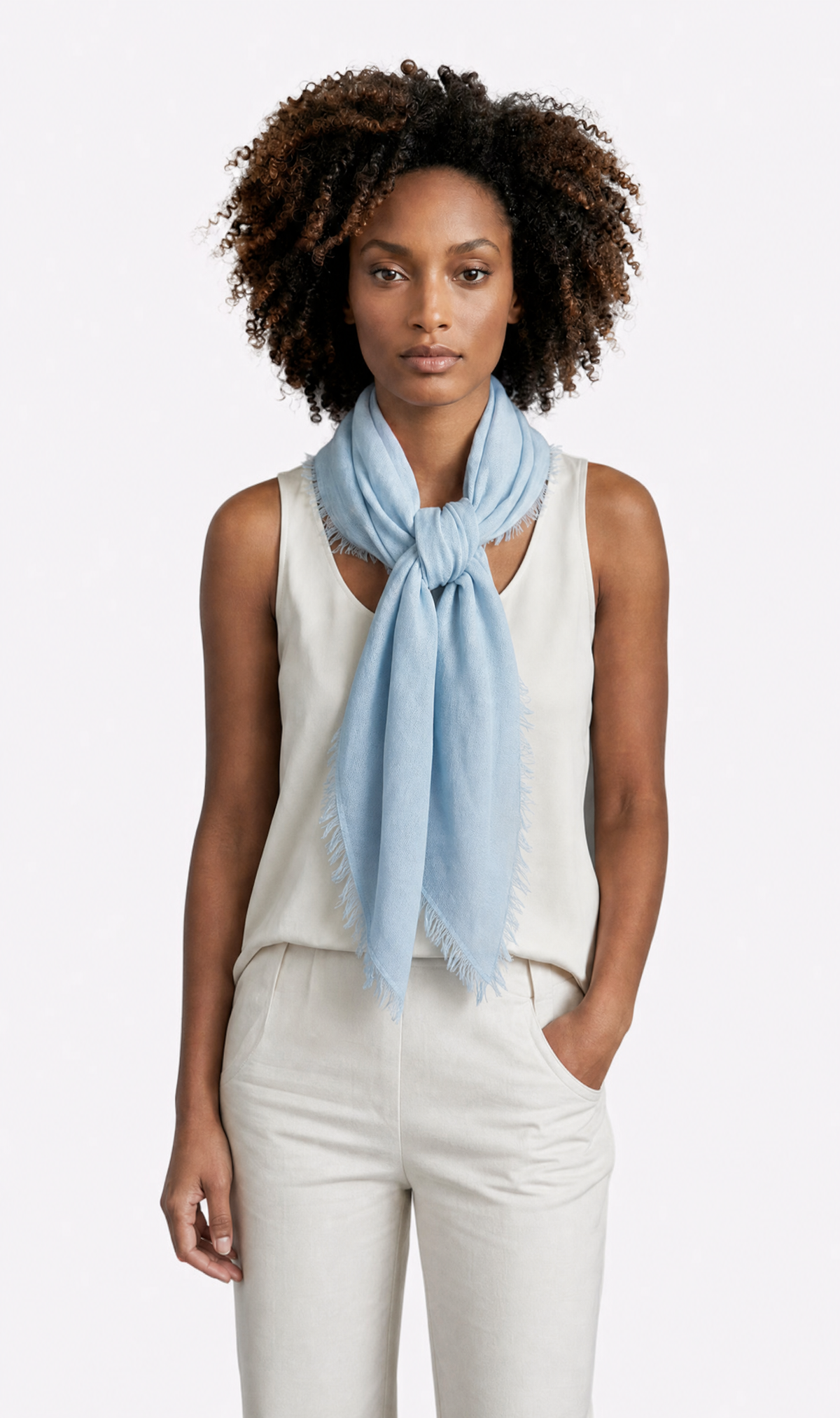 air blue grisal scarf on a woman wearing white on a white background