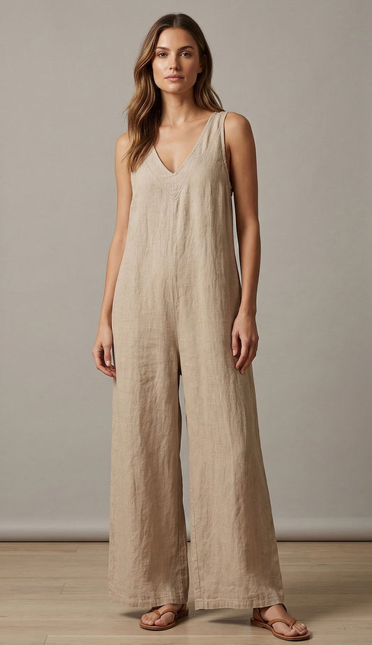 Woman wearing the Milio Milano beige jumpsuit against a beige background
