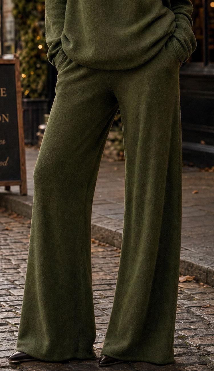 woman wearing viscose flared pants in Italian Olive 