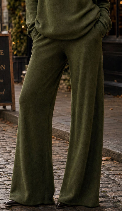 woman wearing viscose flared pants in Italian Olive 