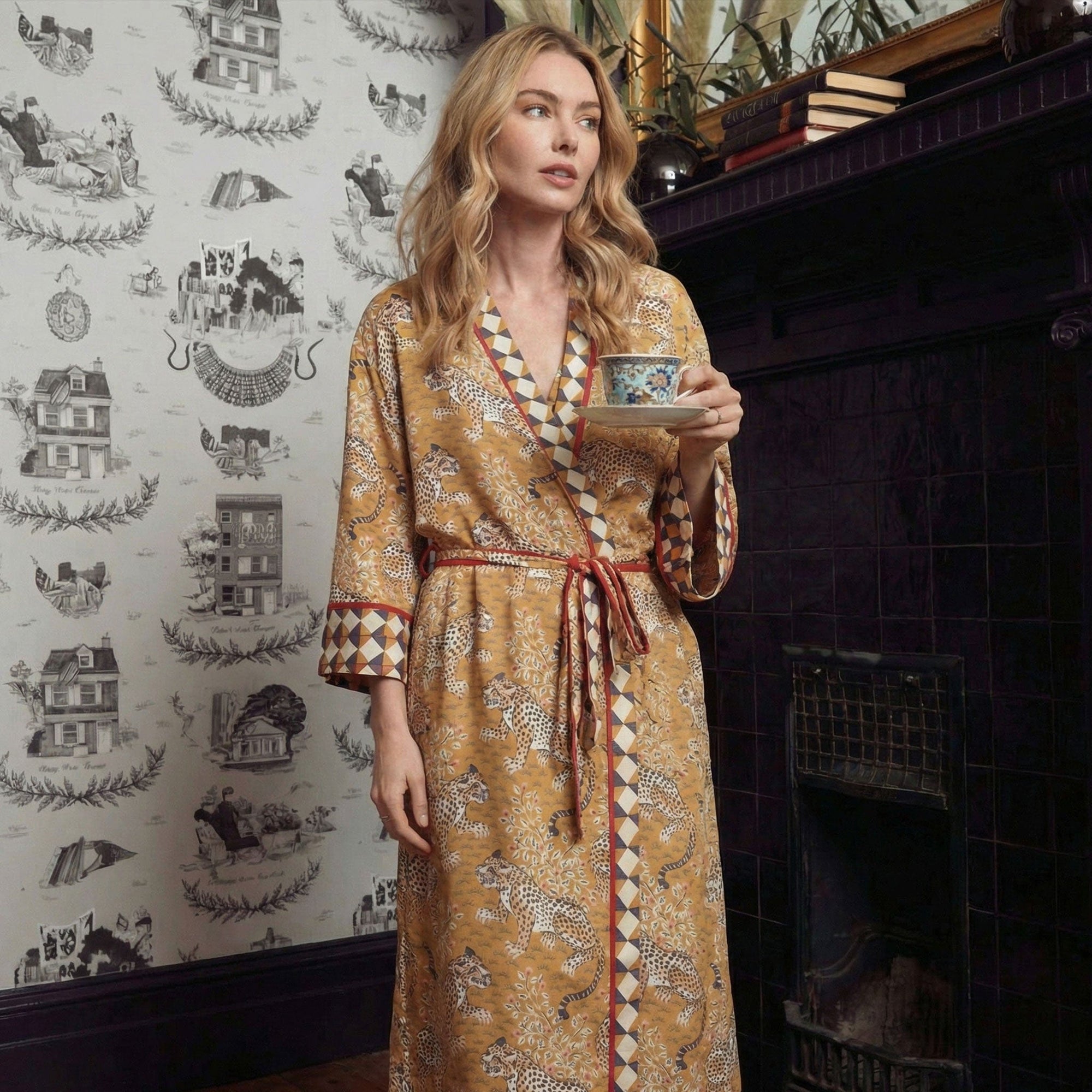 Woman wearing the Printfresh Eco Satin Robe in Bagheera, a patterned women’s luxury robe