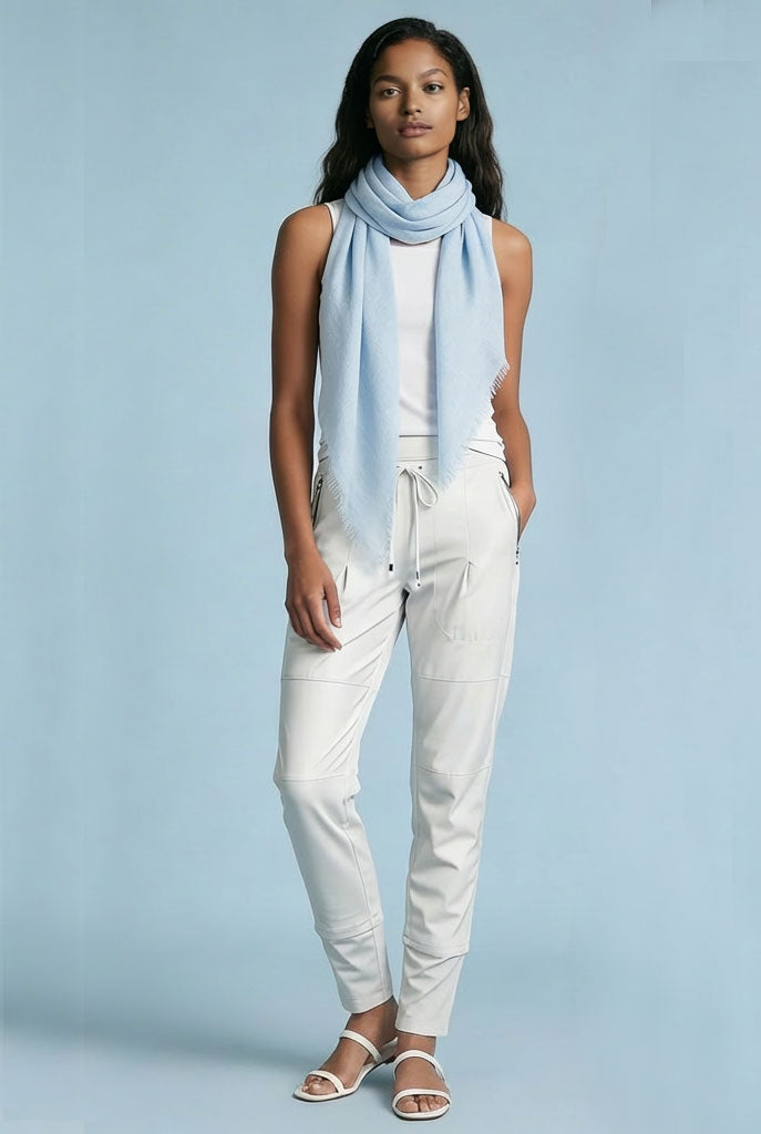 Model styled in Raffaello Rossi Candy Pants with a Goldie tee and Grisal scarf, showcasing women’s designer fashion.