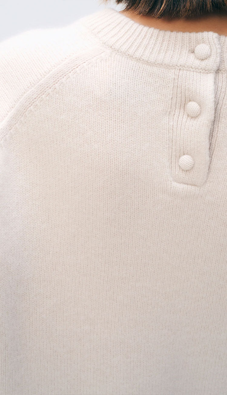 close up of the white and warren scarf sweater back neck view of sweater with 3 buttons