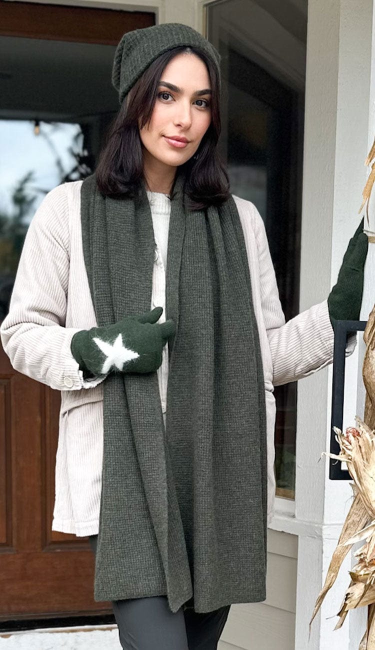 white and warren travel wrap and beanie in thistle green over white sweater