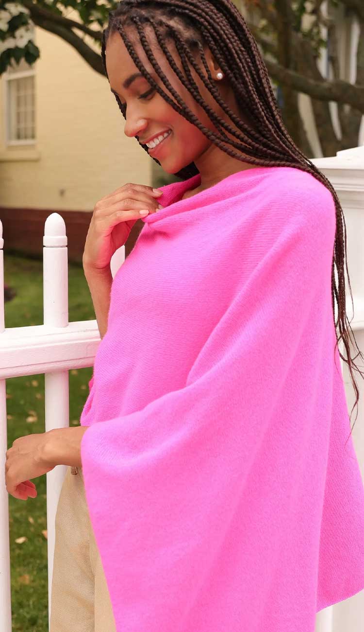 Alashan cashmere topper poncho in tickled pink, lightweight one-size wrap with draped silhouette.