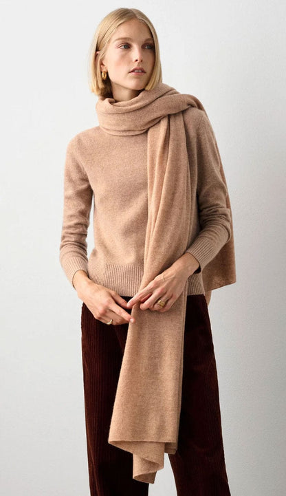 White + Warren cashmere travel wrap in Camel Heather, a lightweight rectangular 100% cashmere wrap styled as a scarf.