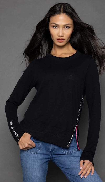 Lisa Todd Zipcode Sweater in black with white hand-stitch detail and pink zipper for a pop of color. Shop Paula & Chlo