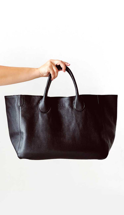 Beck Medium Tote in black. Shop the collection of beck bags in a rainbow of colors.