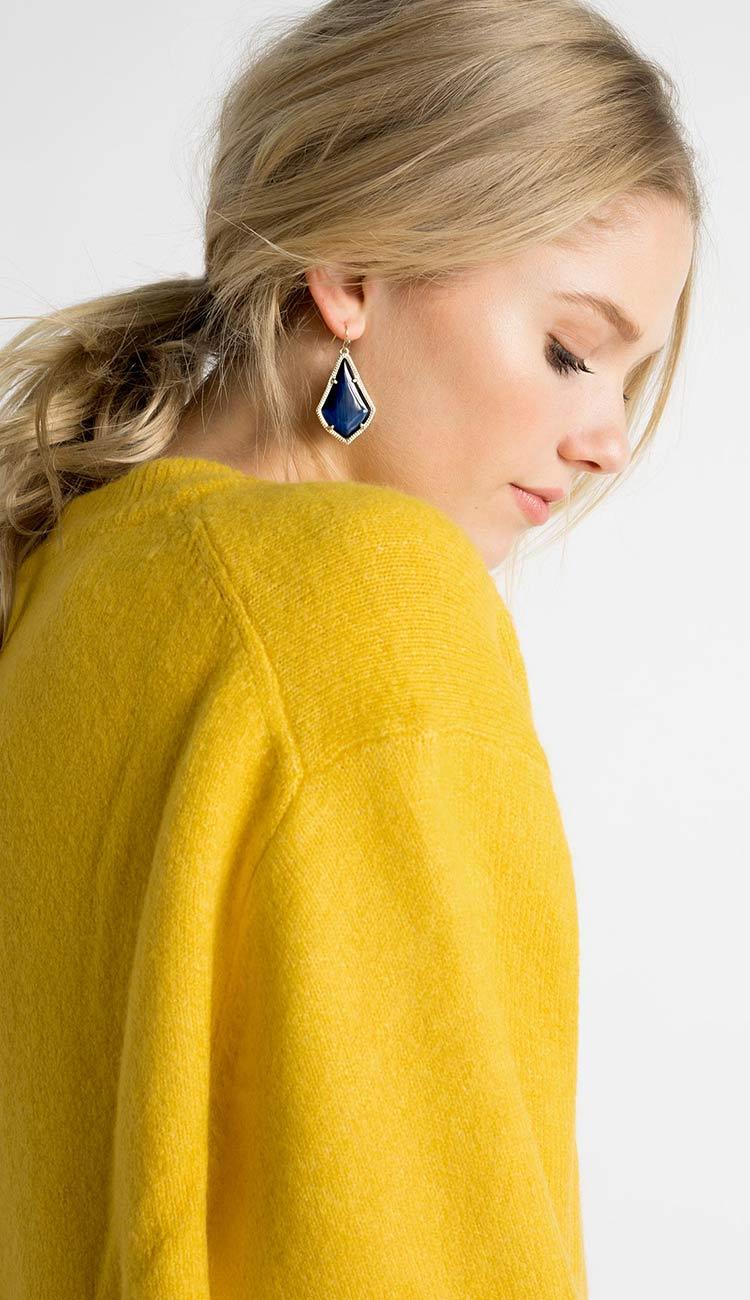 Alex earrings on model by Kendra Scott