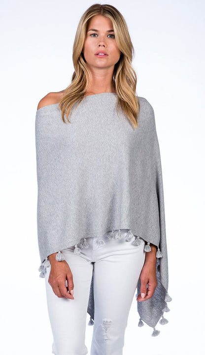 ALASHAN CASHMERE TOSSEL TOPPER IN light ash grey OVER BLUE JEANS