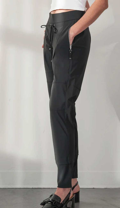 Our best selling pant by Raffaello Rossi - Candy Pant Jogger shown in black with a side view. Shop now at Paula & Chlo. Available in sizes 2 to 16.