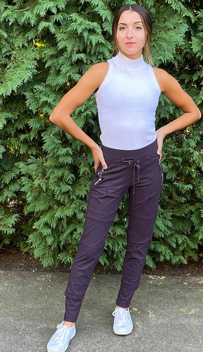 White + Warren Midi Cashmere Skirt in black cashmere with an a-line cut. Back view. shown with the sleeveless mockneck cashmere top shown with Candy Pants in Viola