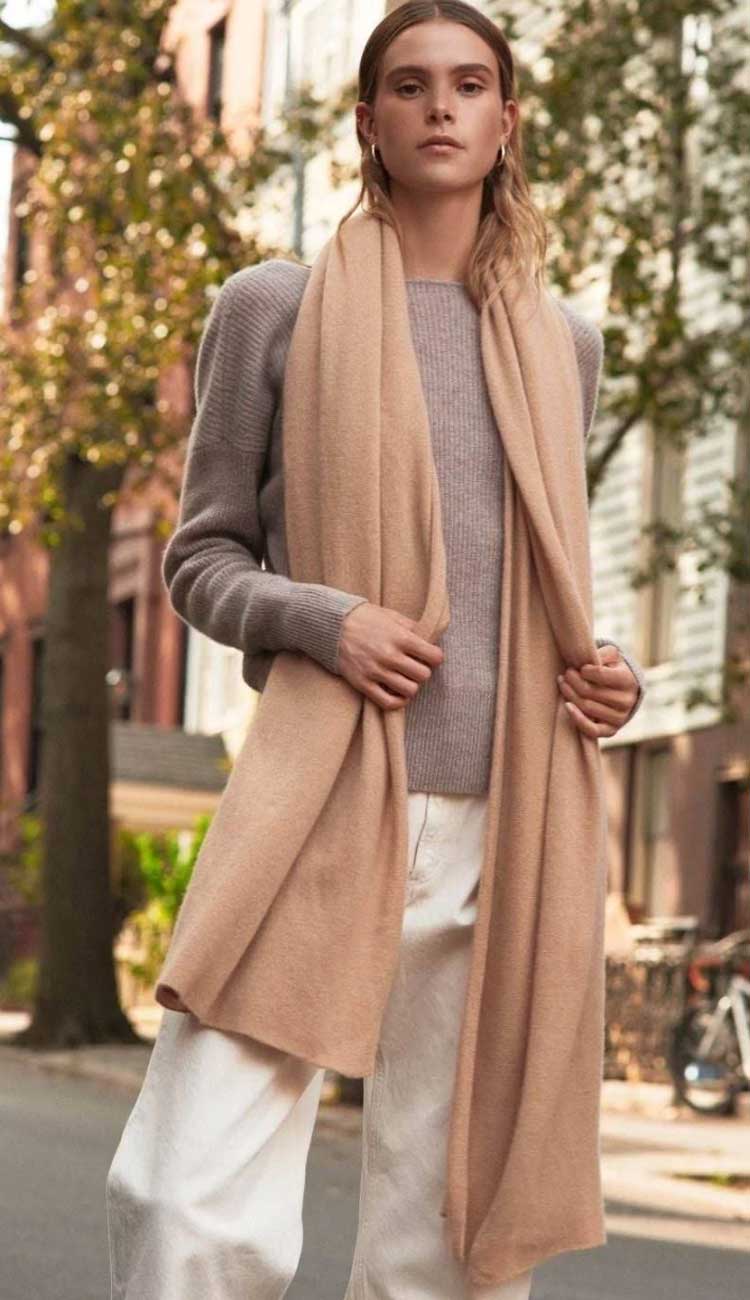 caramel travel wrap by white and warren. The perfect piece for any season. Dress it up or down.