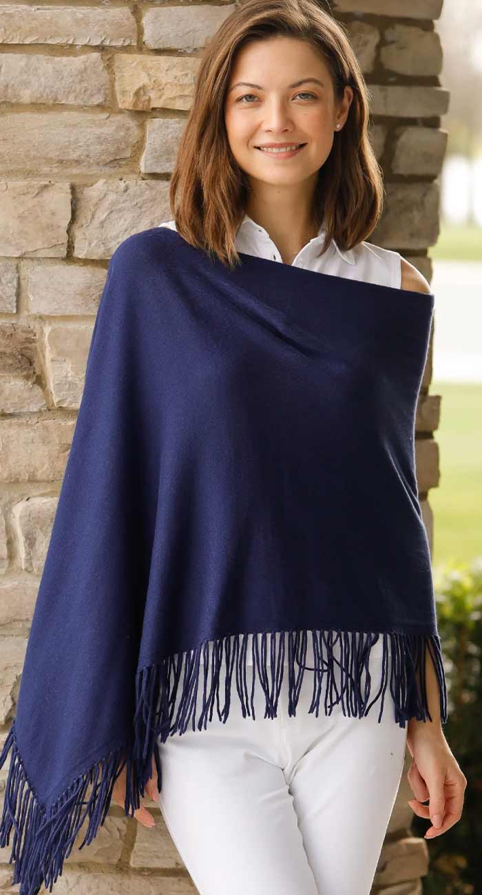 alashan trade wind topper with fringe in navy blue with white top and pants