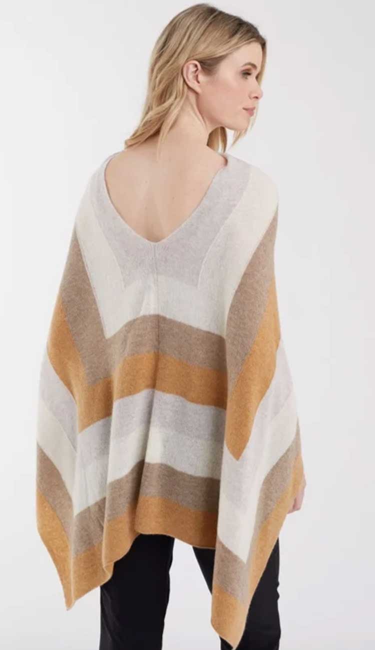 Winter stripe topper in blonde camel combo by Claudia Nichole an Alashan Cashmere Company. Wear it 4 different ways. Makes the perfect gift. Back view.
