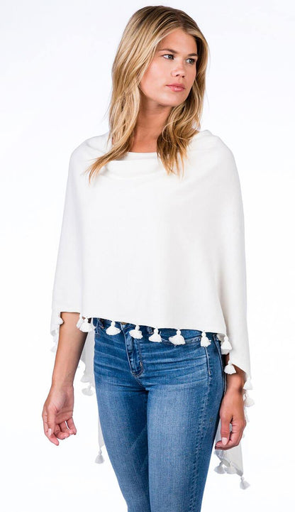 ALASHAN CASHMERE TOSSEL TOPPER IN white OVER BLUE JEANS